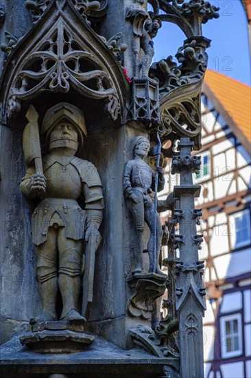 Detail of late Gothic market fountain from around 1500, Bad Urach, Swabian Alb, Baden-Württemberg,