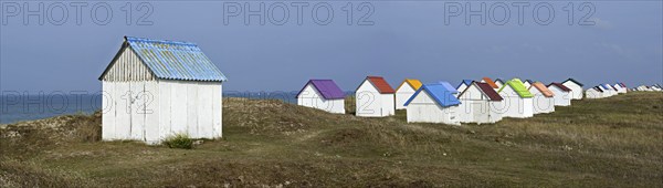 Colourful beach cabins at Gouville-sur-Mer, Lower Normandy, France, Europe