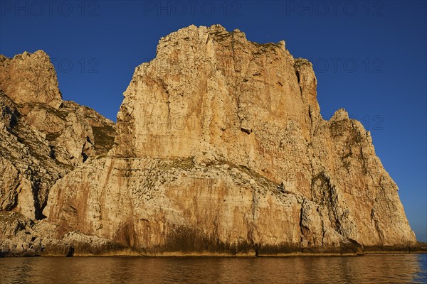 Evening light, Boat tour, View from the sea, Bizarre rock formations, Rugged mountains, Marettimo,