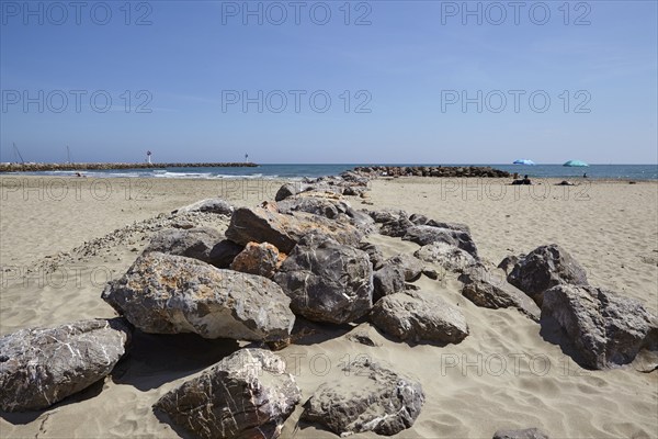Stone groyne on the beach at Frontignan, Hérault, Occitania, France, Europe