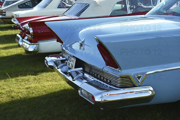 Rear view, Lincoln Premiere, and Ford Fairlane 500, Skyliner, at a classic car meeting in Büsum,