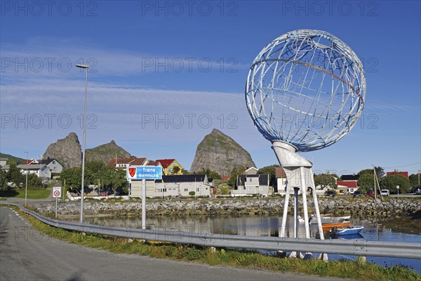 Metal globe, Small harbour village, Steep mountains, Traena, Island, Helgeland, FV 17, Nordland,