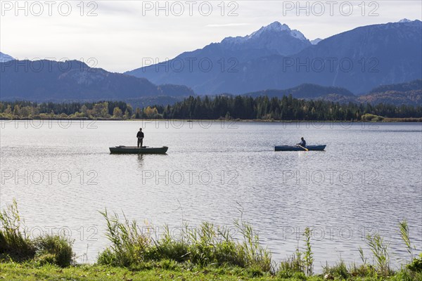 Angler at Lake Hopfensee, Allgäu Alps, Hopfen am See, Ostallgäu, Bavaria, Germany, Europe
