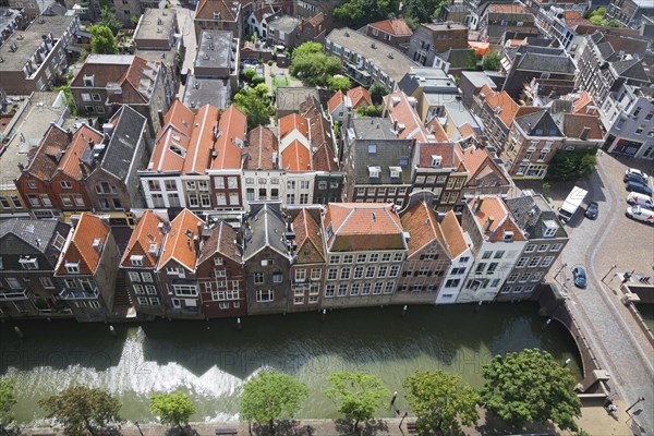 Raised oblique aerial view over historic rooftops in the city centre, Dordrecht, Netherlands