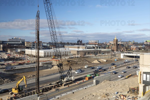 Detroit, Michigan, Workers build the center supports for the Cass Avenue bridge over Interstate 94