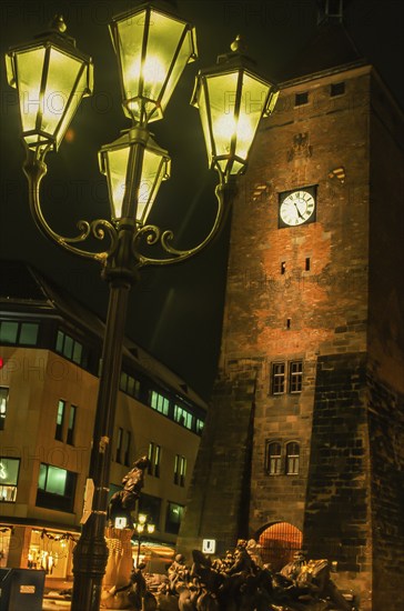 Nuremberg, White Tower illuminated by streetlights at night, Bavaria, Germany, Europe