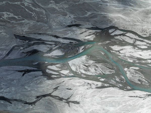 Top-down, aerial view, Burkhan mountain valley with meandering river, Terskey Ala-Too, Tien Shan,
