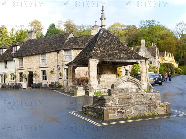 Fourteenth century stone market cross in Castle Combe, Wiltshire, England, UK claimed to be