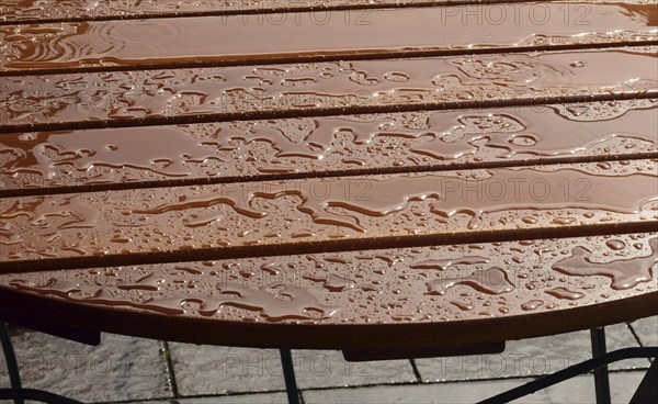 Europe, Germany, Hamburg, Rathausmarkt, Bistro table in the rain, Europe