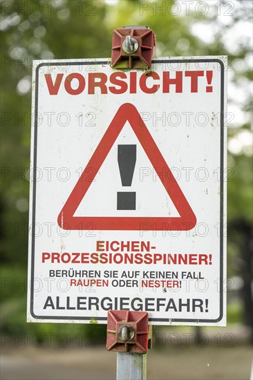 Warning of the oak processionary moth, in a public park, touching can lead to caterpillar