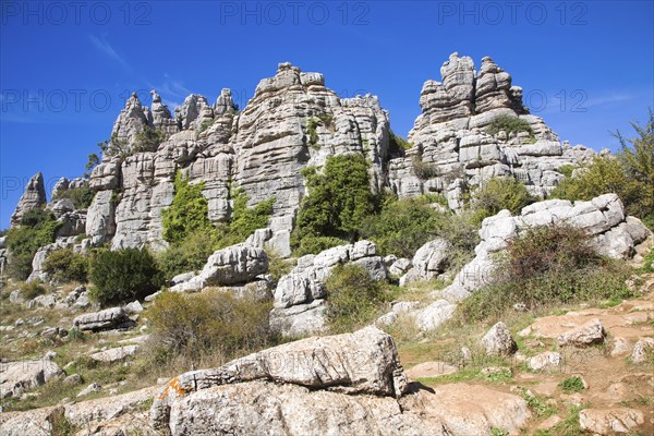 Dramatic limestone scenery of rocks shaped by erosion and weathering at El Torcal de Antequera