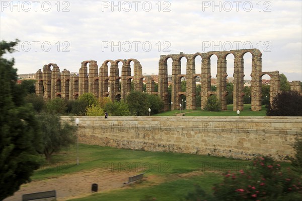 Blurred motion shot from speeding train of Roman aqueduct, Acueducto de Los Milagros, Merida,