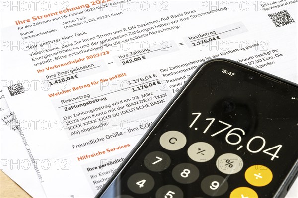 Symbolic image of electricity bill, billing of an electricity provider, additional payment due to