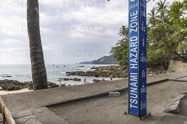 Tsunami Hazard Zone. Warning sign, signposting of escape routes in the event of another seaquake.