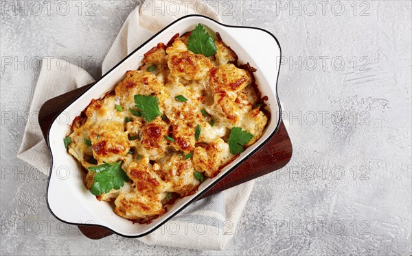 Baked cauliflower, in cream sauce, with cheese and spices, homemade, no people