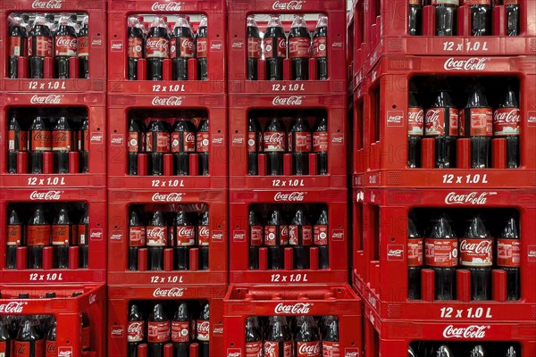 1 litre bottles of sugary drink Coca Cola, Germany, stacked in crates, Europe
