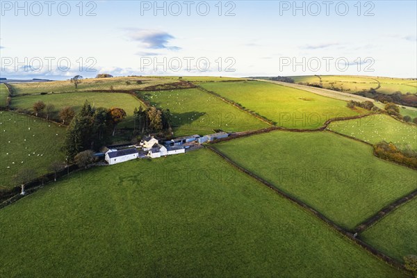 Farms over Trecastle from a drone at sunset, Brecon Beacons National Park, Powys, Wales, England,