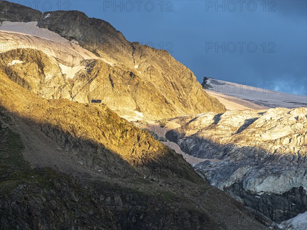 Mountain hut Cabane de Moiry at sunset, Moiry glacier, Valais, Switzerland, Europe