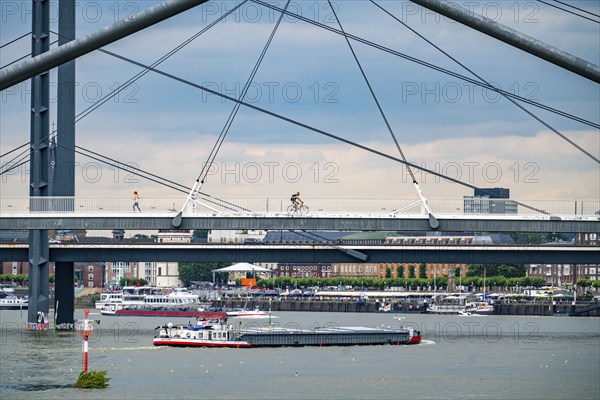 Pedestrian bridge over the Medienhafen, harbour entrance and Rheinkniebrücke, over the Rhine near