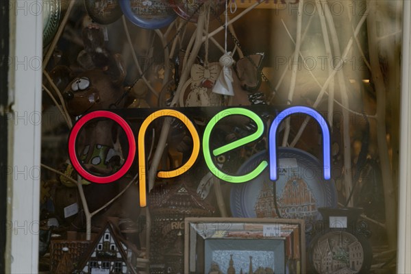 Open lettering in the window of a souvenir shop, Riga, Latvia, Europe