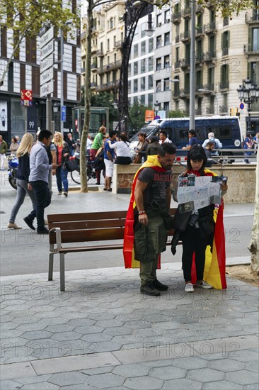 Pedestrians with Spanish flags, demonstration, Spanish bank holidays, 12 October 2016, autonomy,