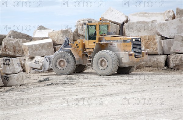 Heavy machinery in a working quarry, Isle of Portland, Dorset, England, United Kingdom, Europe