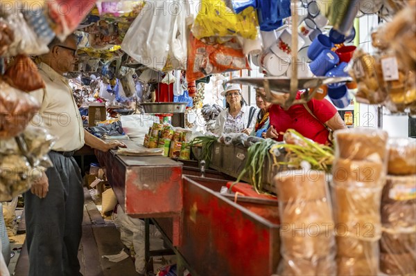 Visitors at a food stall at the counter, Mercado Central de San José, San José, Costa Rica, Central