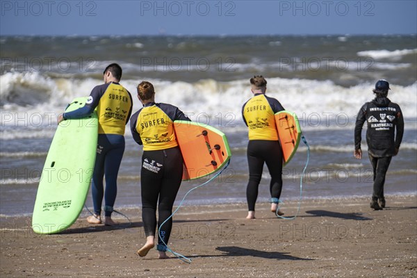 Course for surfers, surfing beginners, on the beach of Scheveningen, Netherlands