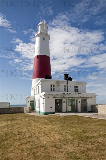 Red and white lighthouse on the coast at Portland Bill, Isle of Portland, Dorset, England, UK