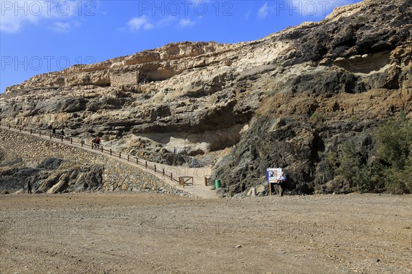 Start of cliff top coastal path on beach at the coastal village of Ajuy, Fuerteventura, Canary