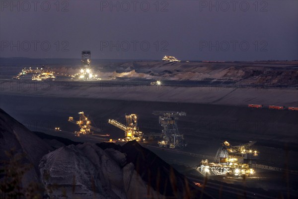 Lignite excavators extract coal in the Welzow open-cast mine, operated by LEAG. The lignite is