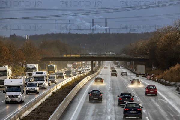 Motorway A3 between Opladen and Leverkusen, rainy weather, autumn, heavy traffic, in the background