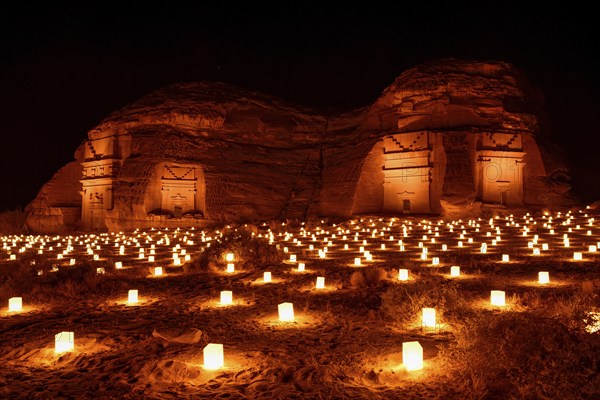 Illuminated Nabataean tombs at night, Hegra or Mada'in Salih, AlUla region, Medina province, Saudi
