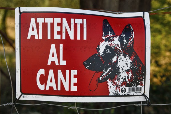 Sign Warning against the dog, near San Quirico d'Orcia, Val d'Orcia, Orcia Valley, Tuscany, Italy,