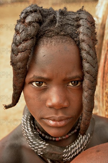 Himba girl with typical hairstyle, Omuramba, Kaokoland, Kunene, Namibia, Africa