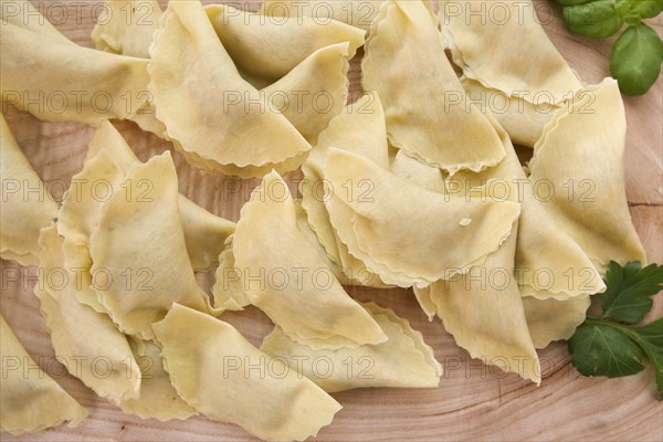 Swabian cuisine, preparation of salmon ravioli, stuffed raw pasta patties, fish dish, salmon in