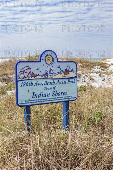 Sign indicates public access to the white sand beach of Indian Shores, Florida, USA, North America