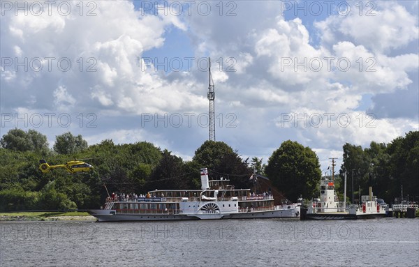 Rescue helicopter near paddle steamer Freya in the Kiel Canal, Kiel Canal, Schleswig-Holstein,