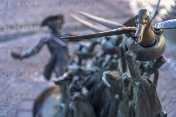 Münchhausen figure The ducks on a string at the Münchhausen fountain in Bodenwerder, Lower Saxony,