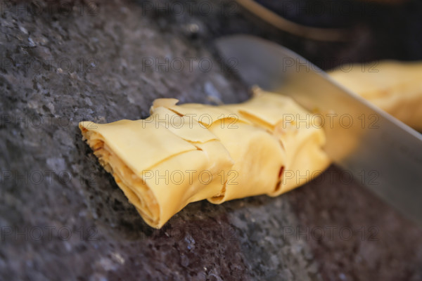 Swabian cuisine, preparation of cabbage fritters, Swabian flour sacks, stuffed pasta pancakes with