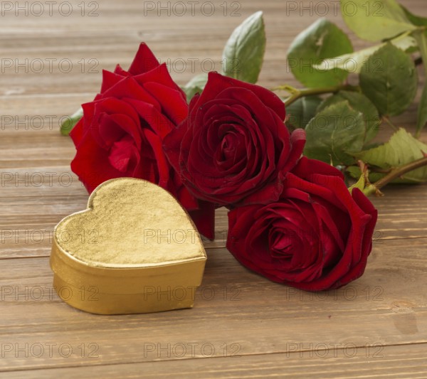 Roses as a gift and surprise for a celebration. Symbol photo for birthday, Mother's Day, love,