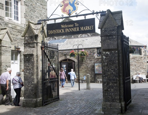 Traditional market place and building with welcome sign, Pannier Market, Tavistock, Devon, England,