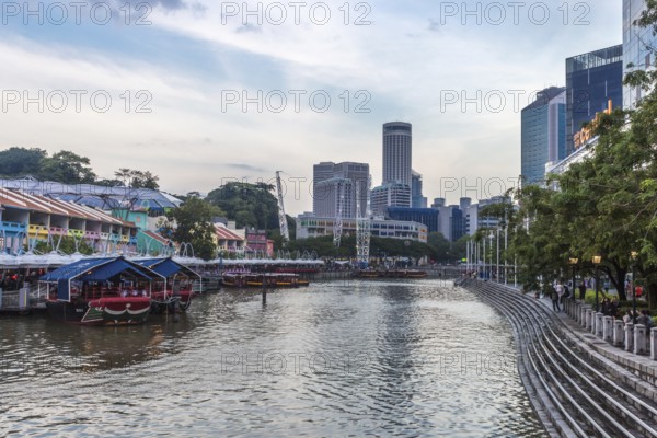 Clarke Quay in evening, coloured buildings and skyscapers