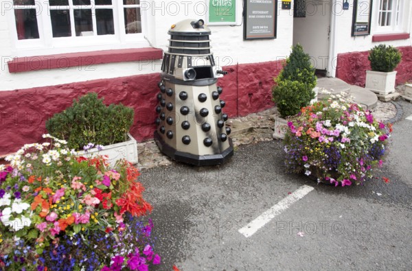 Dr Who Dalek model used as a waste bin, Aldbourne, Wiltshire, England, United Kingdom, Europe