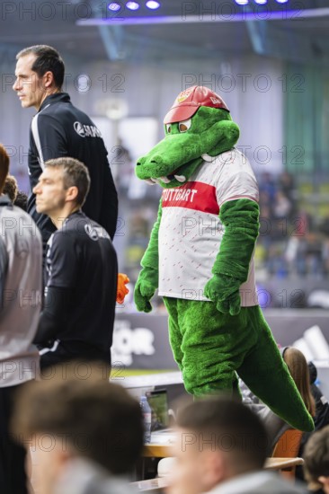 A green mascot entertains the spectators at a sporting event, Mercedes Benz Junior Cup, Glaspalast