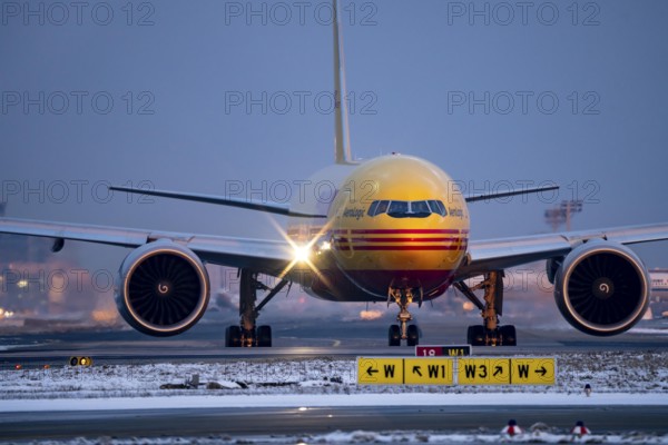 DHL, AeroLogic, Boeing 777F, on the taxiway to Runway West, Frankfurt FRA Airport, Fraport, in