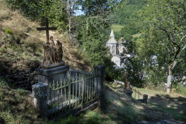 Orcival in Auvergne Volcanoes Regional Natural Park, Statues of Christ's Way of the Cross. Puy de
