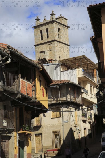 Church tower traditional houses with balconies, Garganta la Olla, La Vera, Extremadura, Spain,