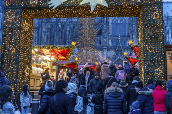Christmas market at Roncalli Platz am Dom, in the city centre of Cologne, Sunday shopping in