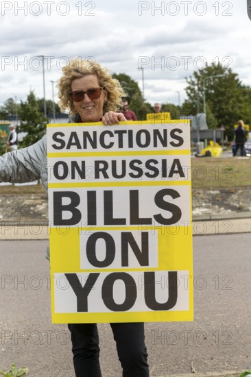 Protest at busy roundabaout, Martlesham, Suffolk, England, UK, opposition to sanctions on Russia